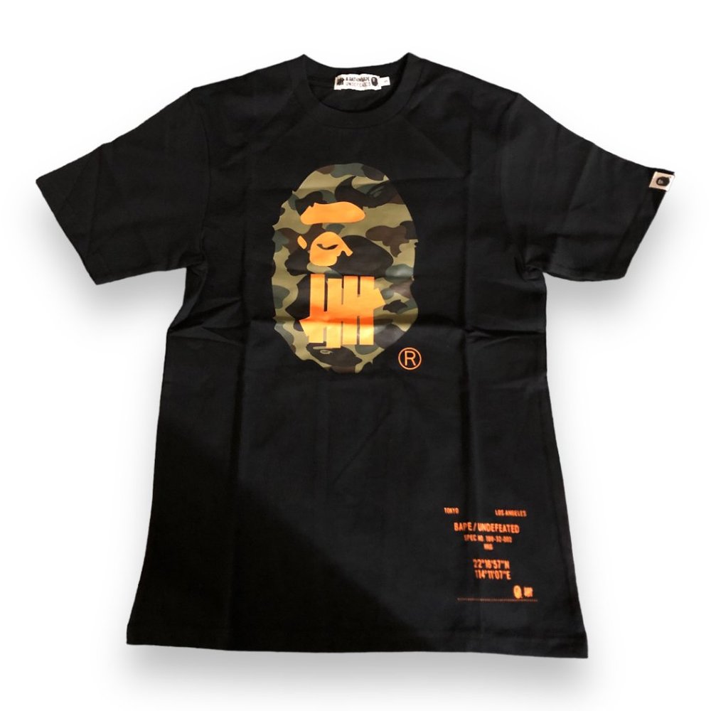 BAPE x Undefeated Sport Is War Ape Head Tee Black / Orange